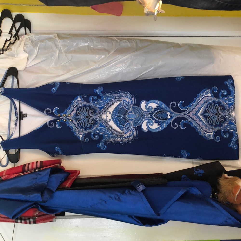 Brand new with tags beautiful patterned blue dress